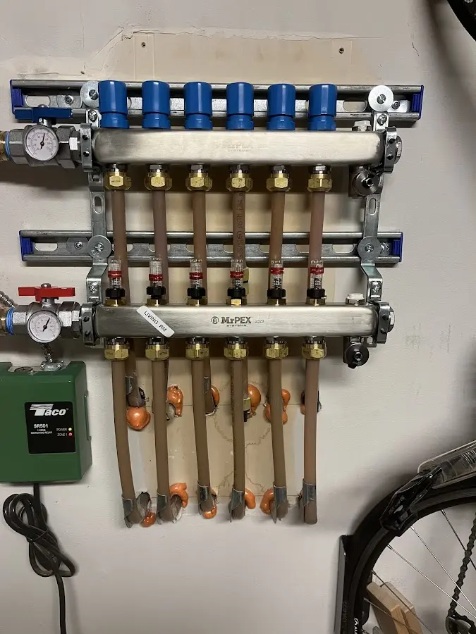 Plumber performing Leak Detection at a residential property in Urbandale